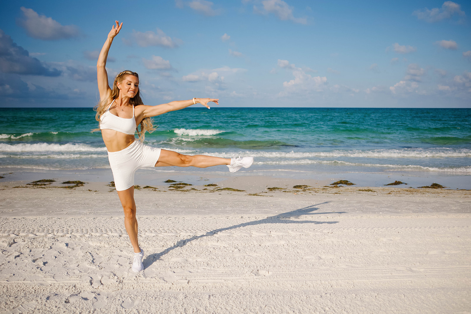 Rebecca in white, dancer pose