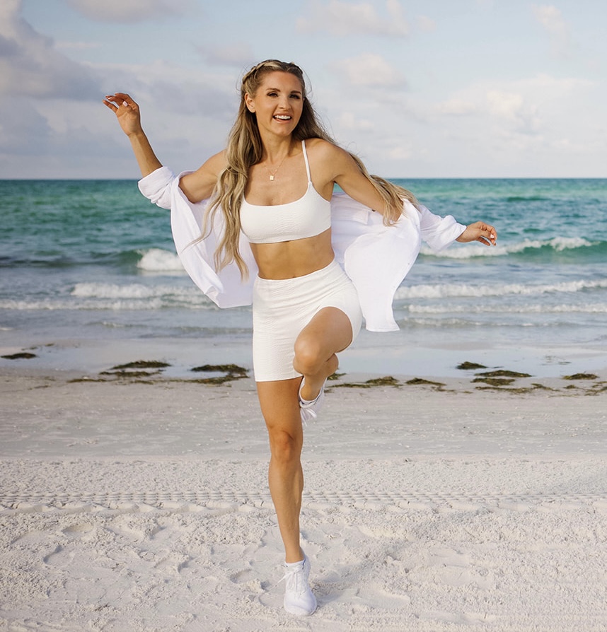 Rebecca Louise in white, mid-skip